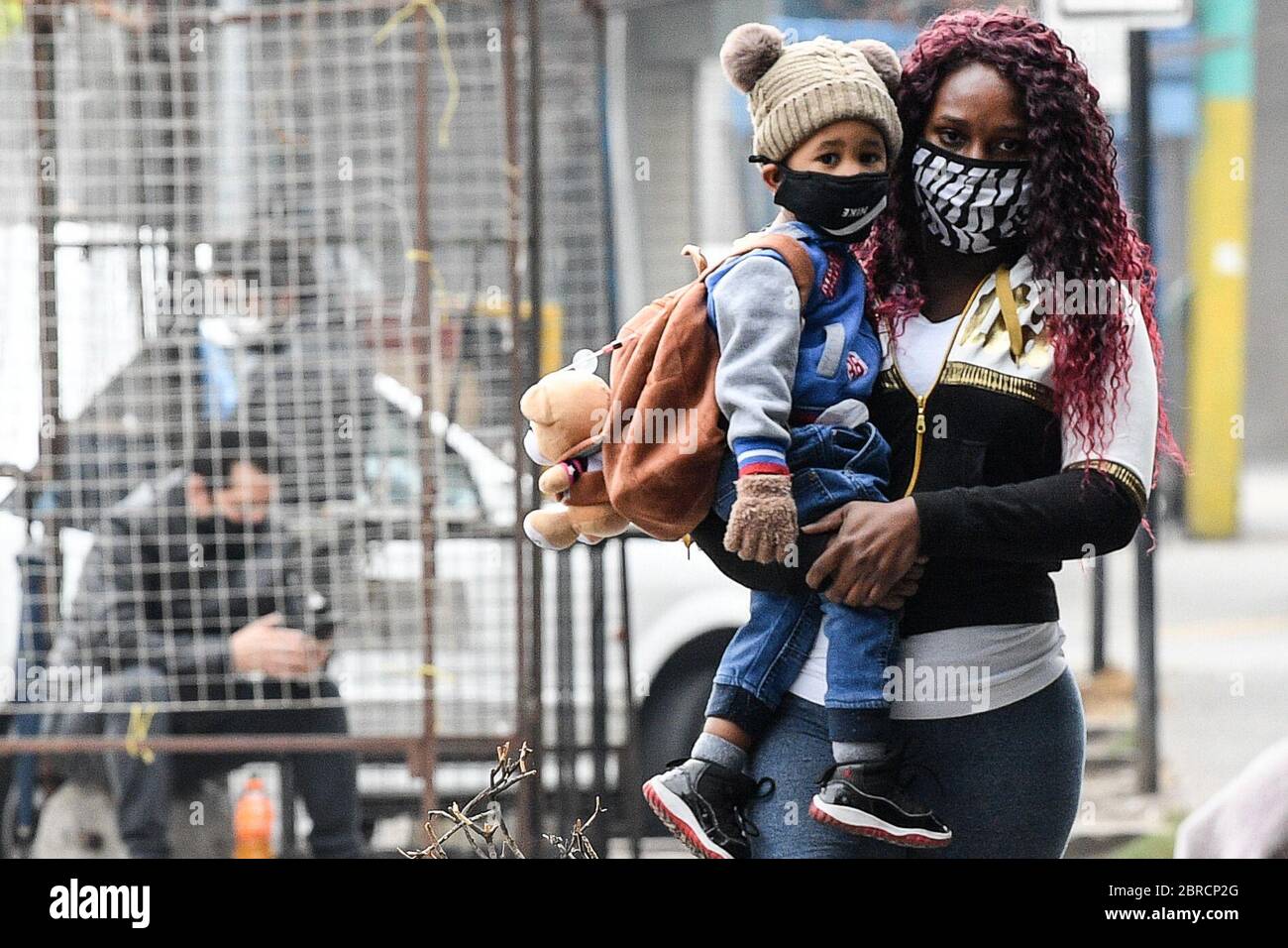 Santiago, Chile. 20th May, 2020. A woman is seen with her child near San Jose Hospital in Santiago, Chile, May 20, 2020. Credit: Jorge Villegas/Xinhua/Alamy Live News Stock Photo