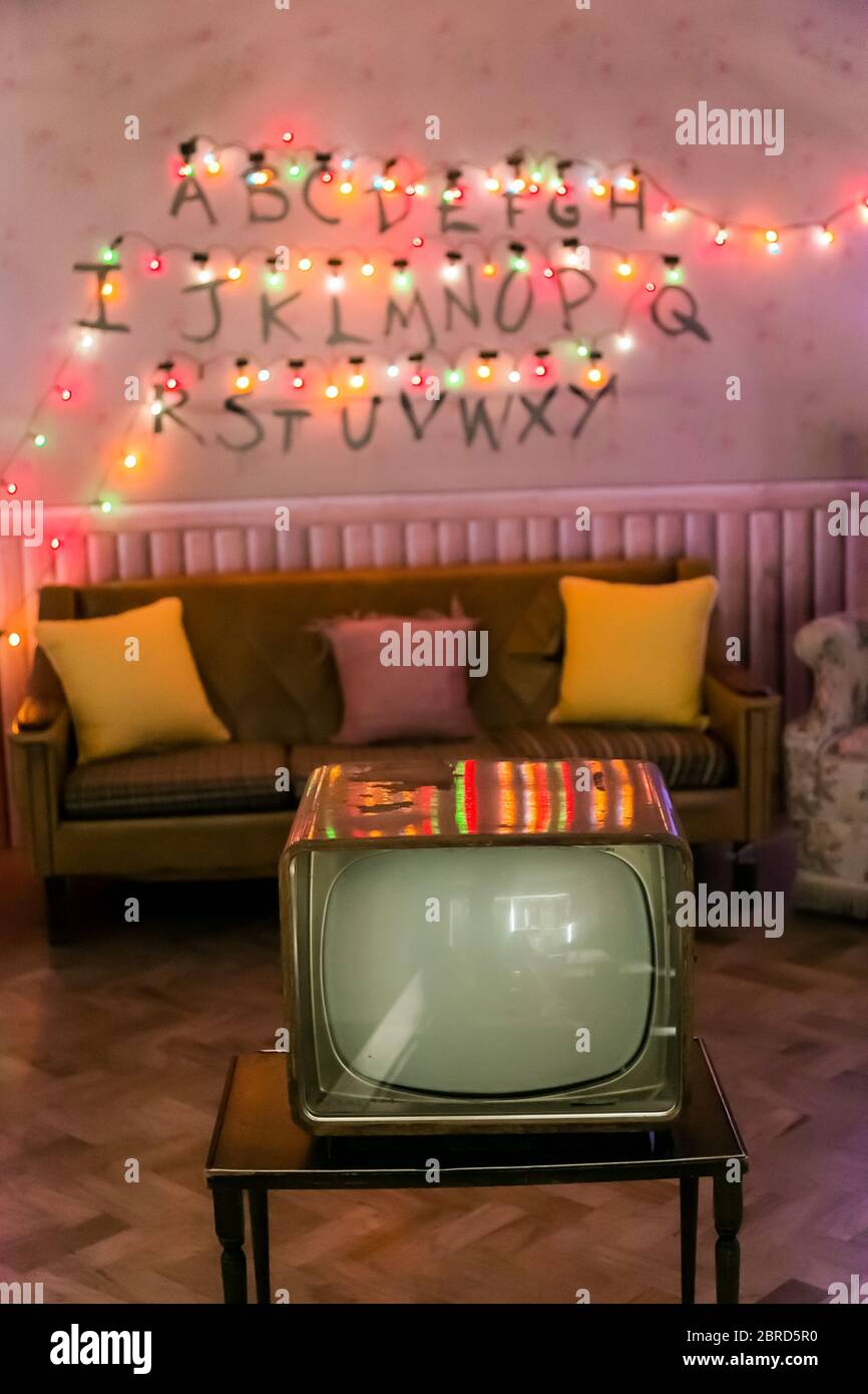 Johannesburg, South Africa - October 19, 2017: Inside Interior of a home lounge with Stranger Things and Netflix branded cushions and decor Stock Photo
