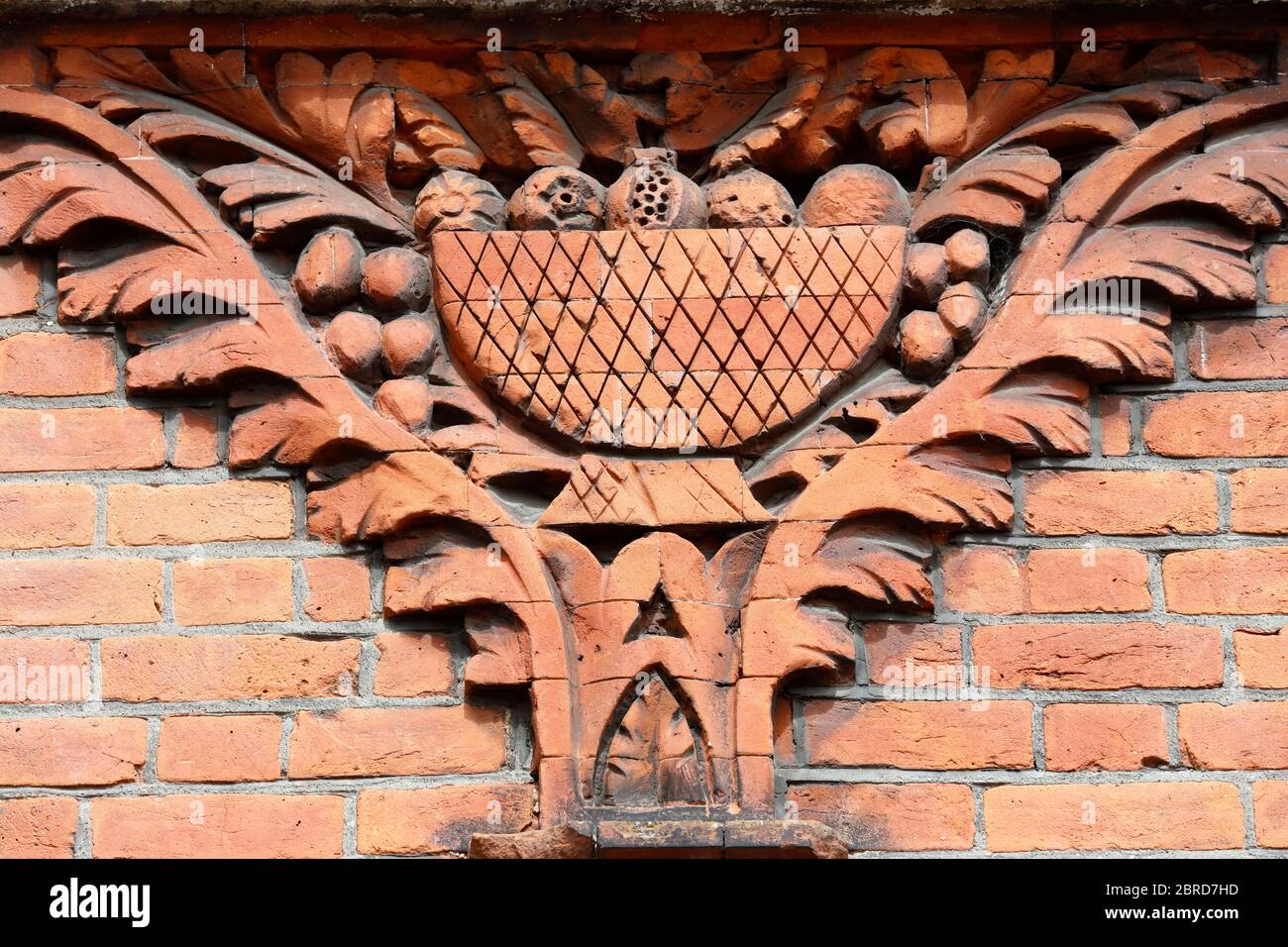 Terracotta decoration on housing on Elmbourne Road, Heaver Estate, Tooting, London, UK Stock Photo