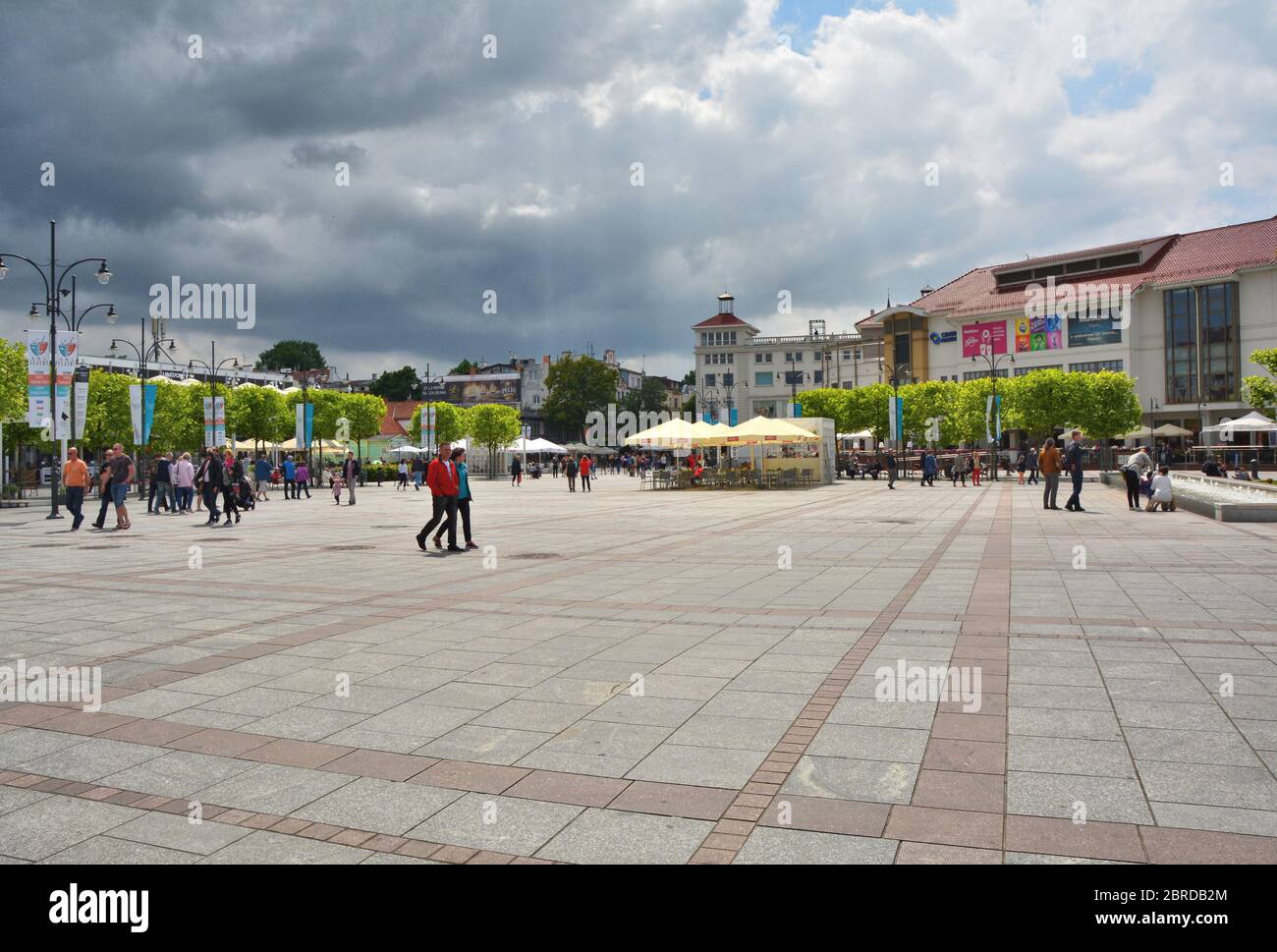 SOPOT, POLAND - JUNE 25, 2015: People walk on Plac Zdrojowy market square in city center. Sopot is a major spa and tourist seaside resort in Poland Stock Photo