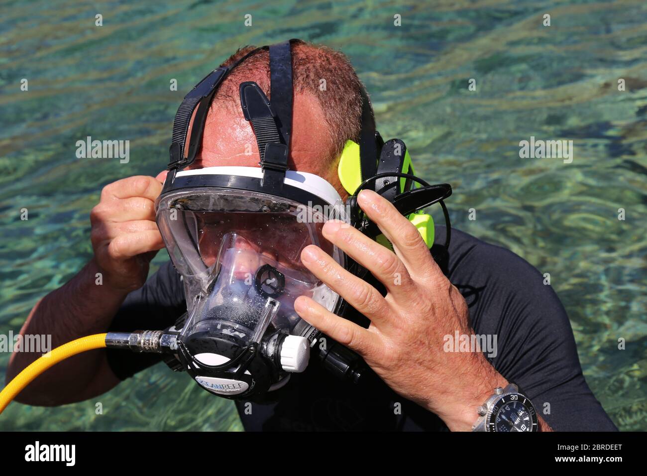 Scuba Diver with Full Face Mask Stock Photo
