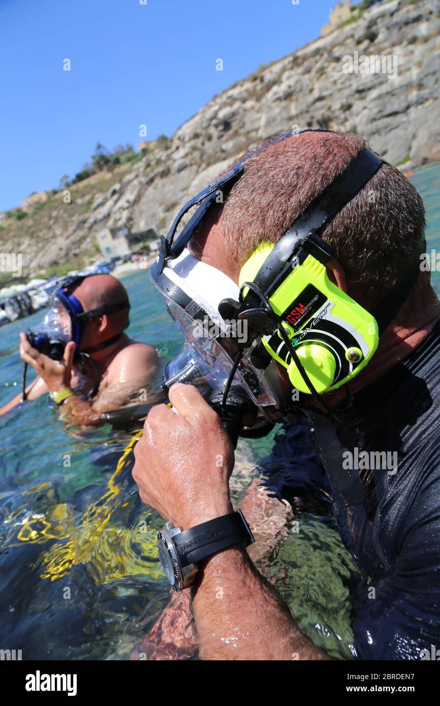 Scuba Diver with Full Face Mask Stock Photo