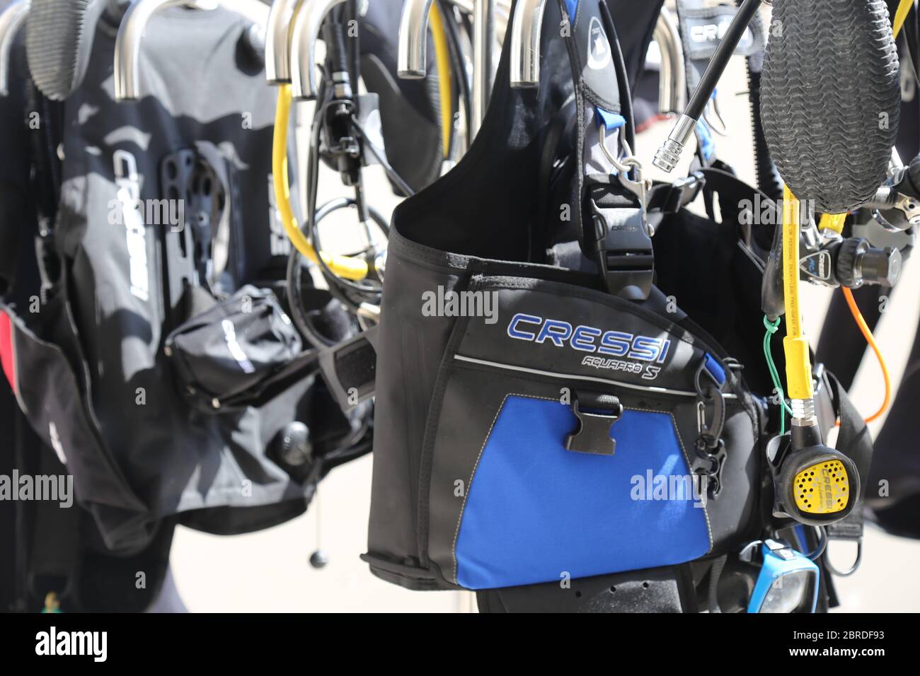 Scuba diving equipment in a diving shop, bcd and regulators Stock Photo