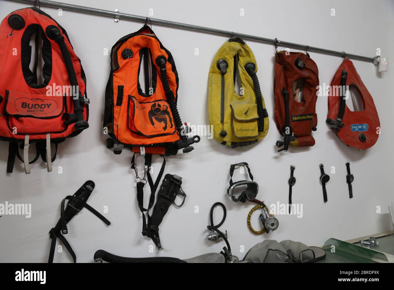 Group of old vintage diving scuba equipment with buoyancy vest