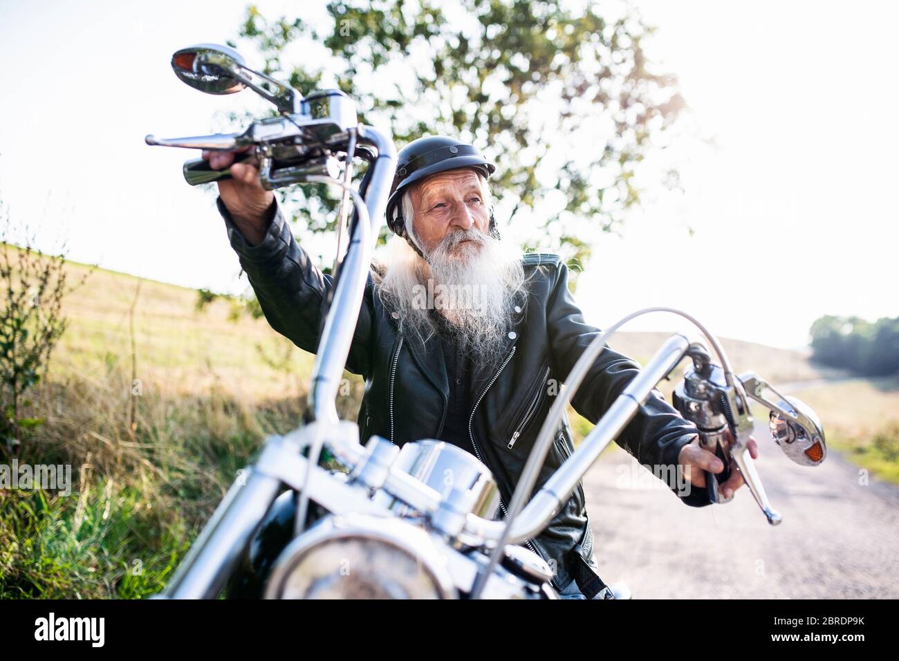 Senior man in leather jacket hi-res stock photography and images - Alamy