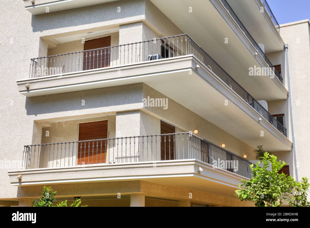 Vintage pastel apartment building with window and balcony in Tel-Aviv. Israel Stock Photo