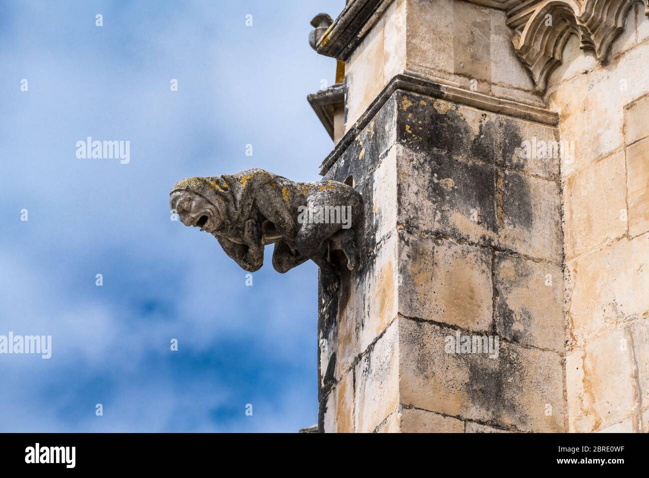 Gargoyle on facade of Monastery of Saint Mary of the Victory in Batalha, Portugal Stock Photo