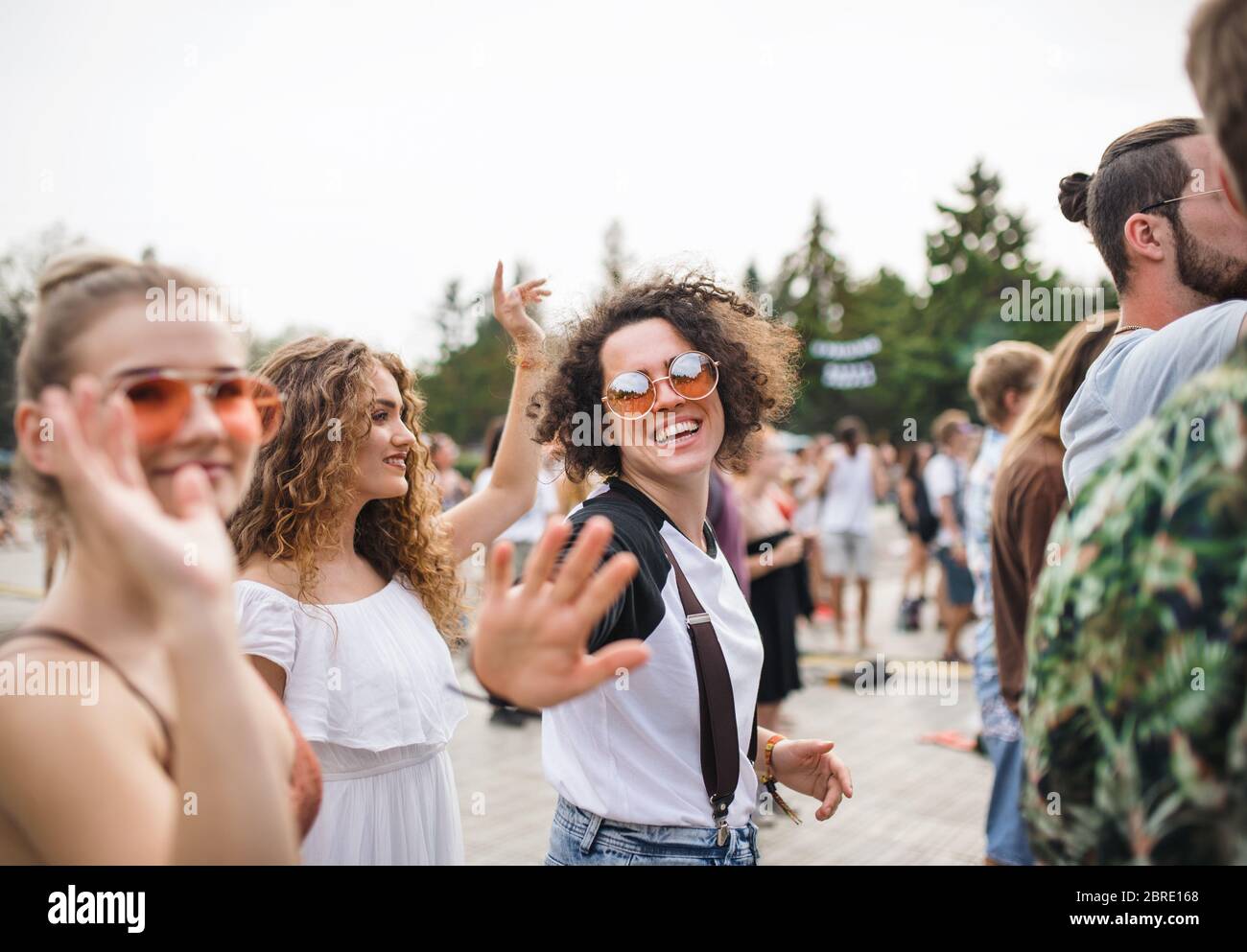 Group of young friends at summer festival. Stock Photo