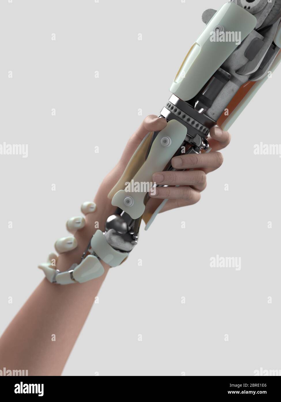 holding hands of a robot and human Stock Photo