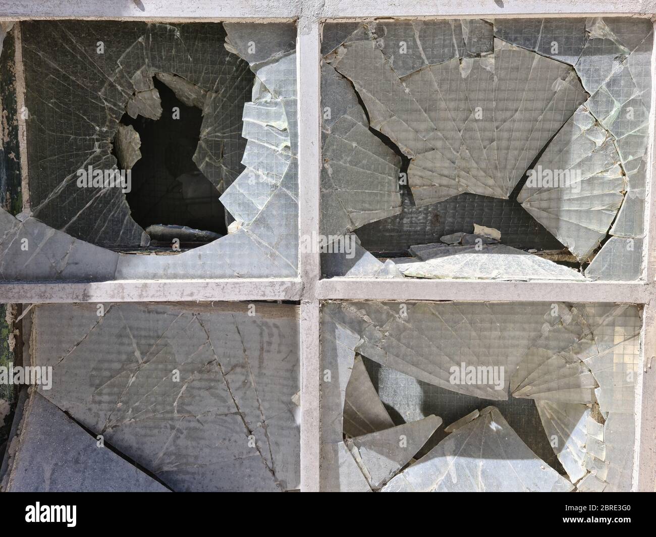 Cracked window in an old abandoned house Stock Photo Alamy