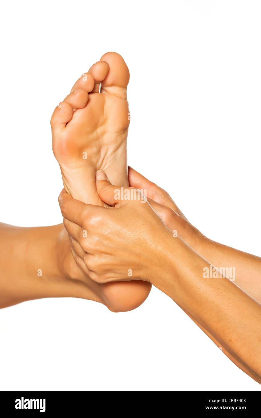 Foot massage woman Cut Out Stock Images & Pictures Alamy