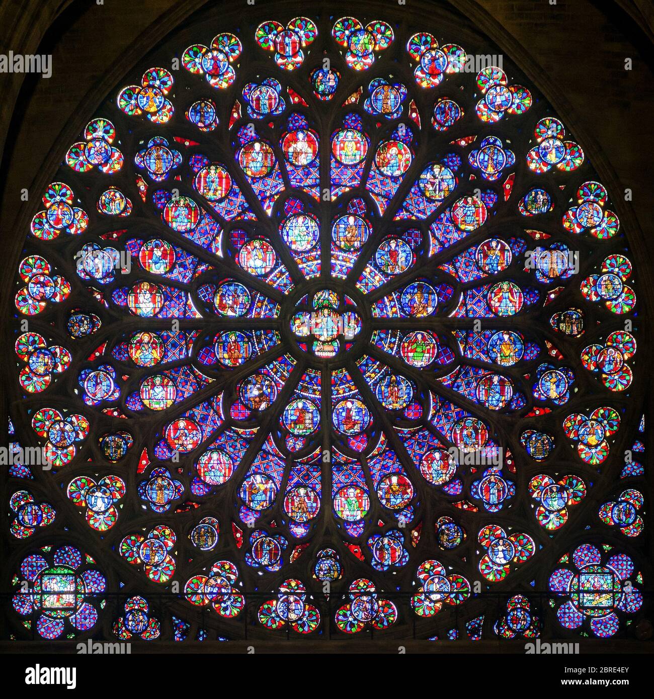 Rose stained glass window of Notre Dame Cathedral in Paris Stock Photo