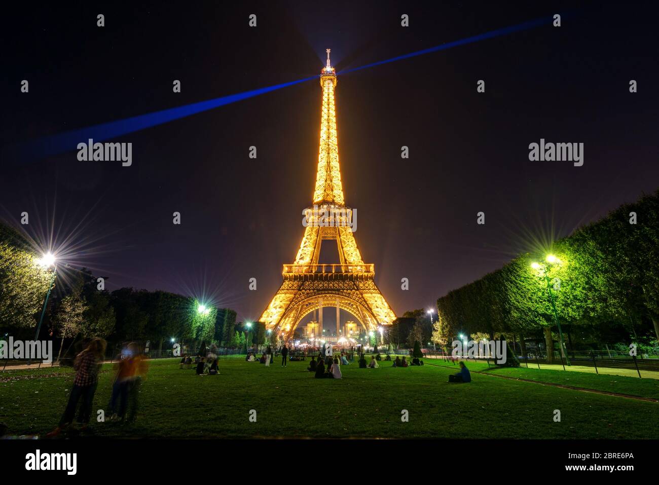 PARIS - SEPTEMBER 24: Lighting of the Eiffel tower at night on september 24, 2013 in Paris. The Eiffel tower is one of the major tourist attractions o Stock Photo