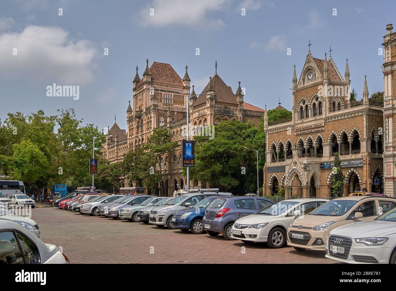 27 May 2014 Parking lot at Kalaghoda and old architecture Heritage buildings of Bombay Mumbai ; Maharashtra ; India Stock Photo