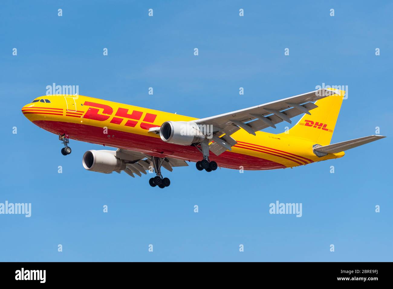 EAT Leipzig DHL Airbus A300 cargo jet airliner plane landing at London Heathrow Airport over Cranford, London, UK during COVID-19 lockdown. Stock Photo