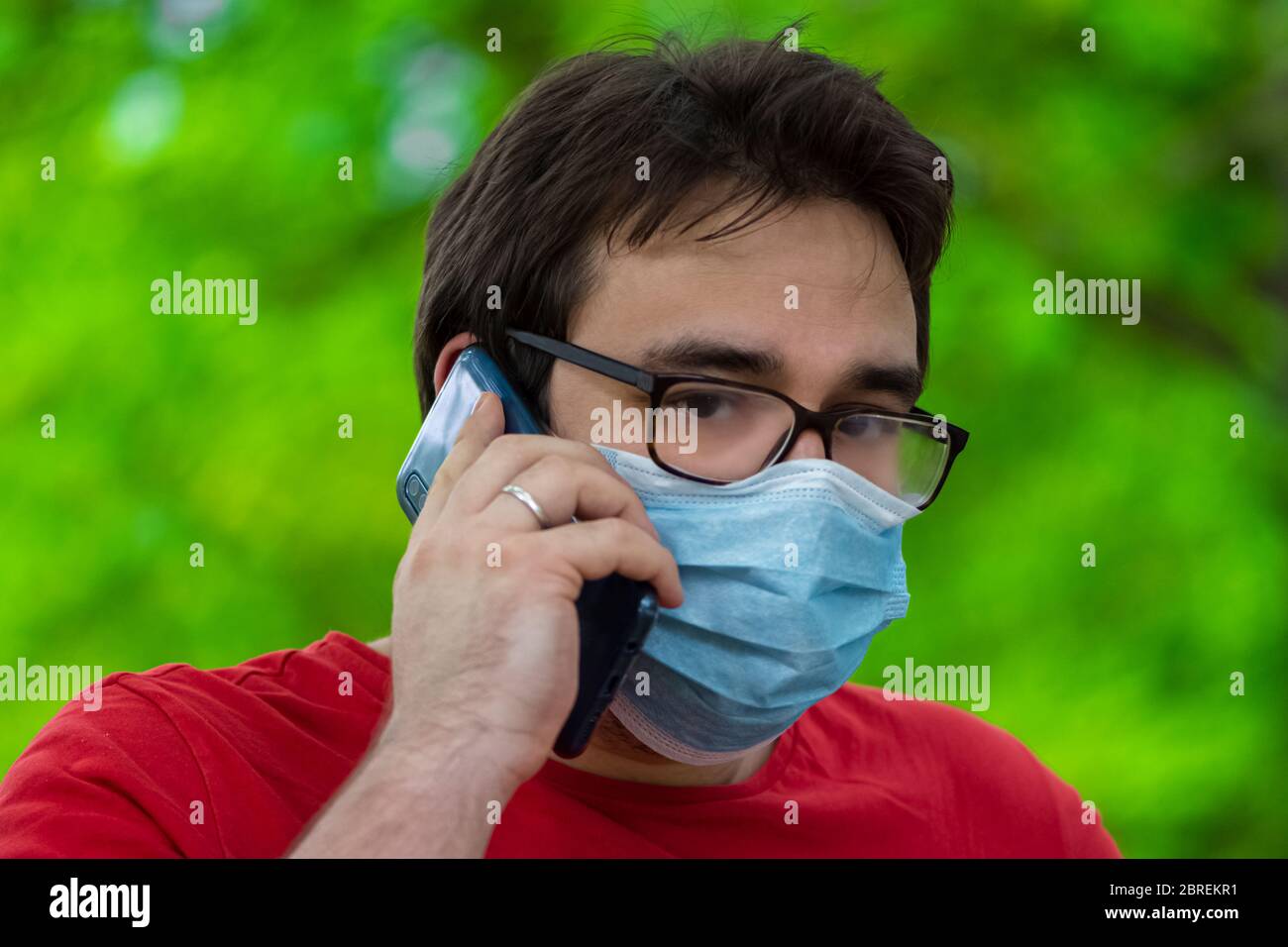 Steps wearing surgical face mask hi-res stock photography and images ...