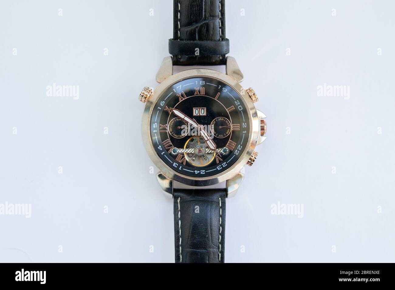 men's gold watch with leather strap Stock Photo Alamy