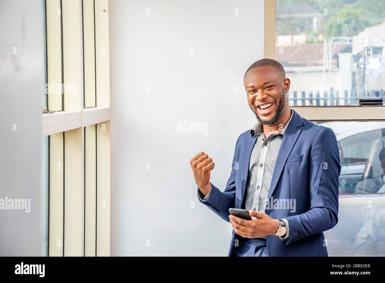 Excited young man reacting win hi-res stock photography and images - Alamy