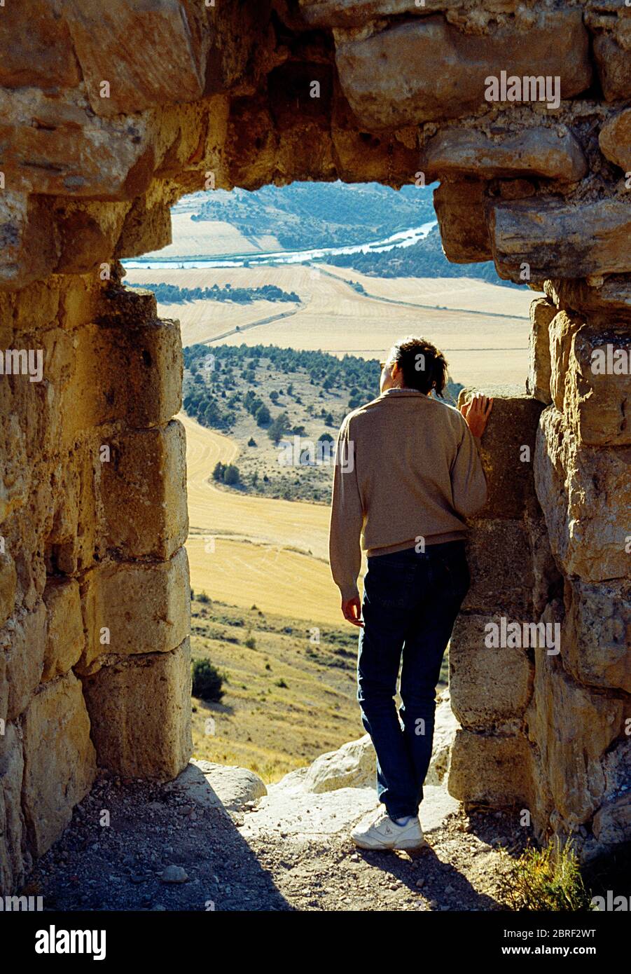 Tourist at the castle. Gormaz, Soria province, Castilla Leon, Spain. Stock Photo