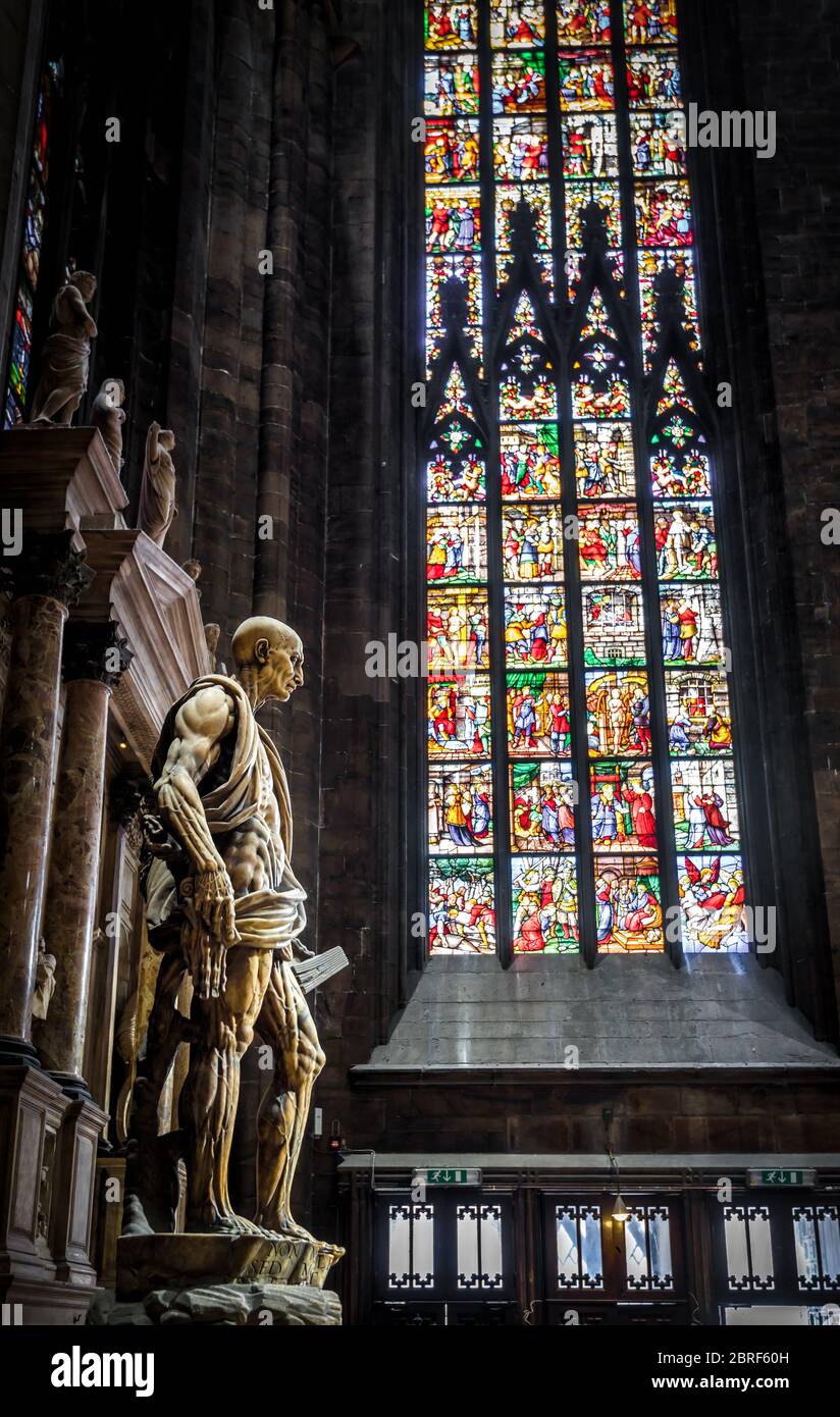 Milan, Italy - May 16, 2017: The statue of Saint Bartholomew Flayed in the Milan Cathedral (Duomo di Milano). Milan Cathedral is the largest church in Stock Photo