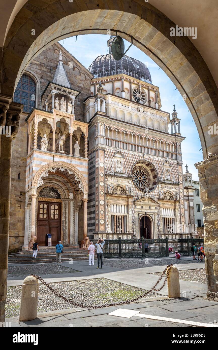 Basilica of Santa Maria Maggiore in Citta Alta of Bergamo, Italy. Ornate medieval church with luxury facade is a landmark of Bergamo. Renaissance arch Stock Photo