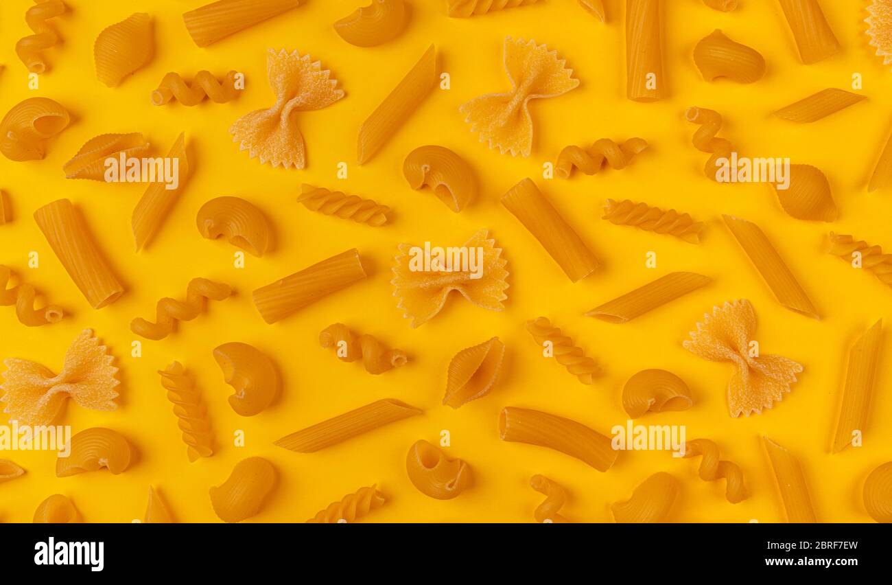 Italian pasta pattern, different pasta types on yellow background, flat ...