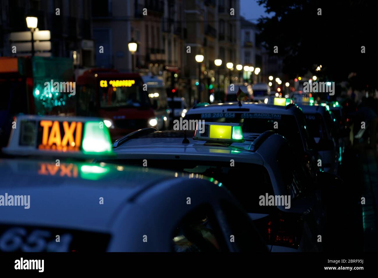 Taxi rank at night, Granada, Spain. Stock Photo