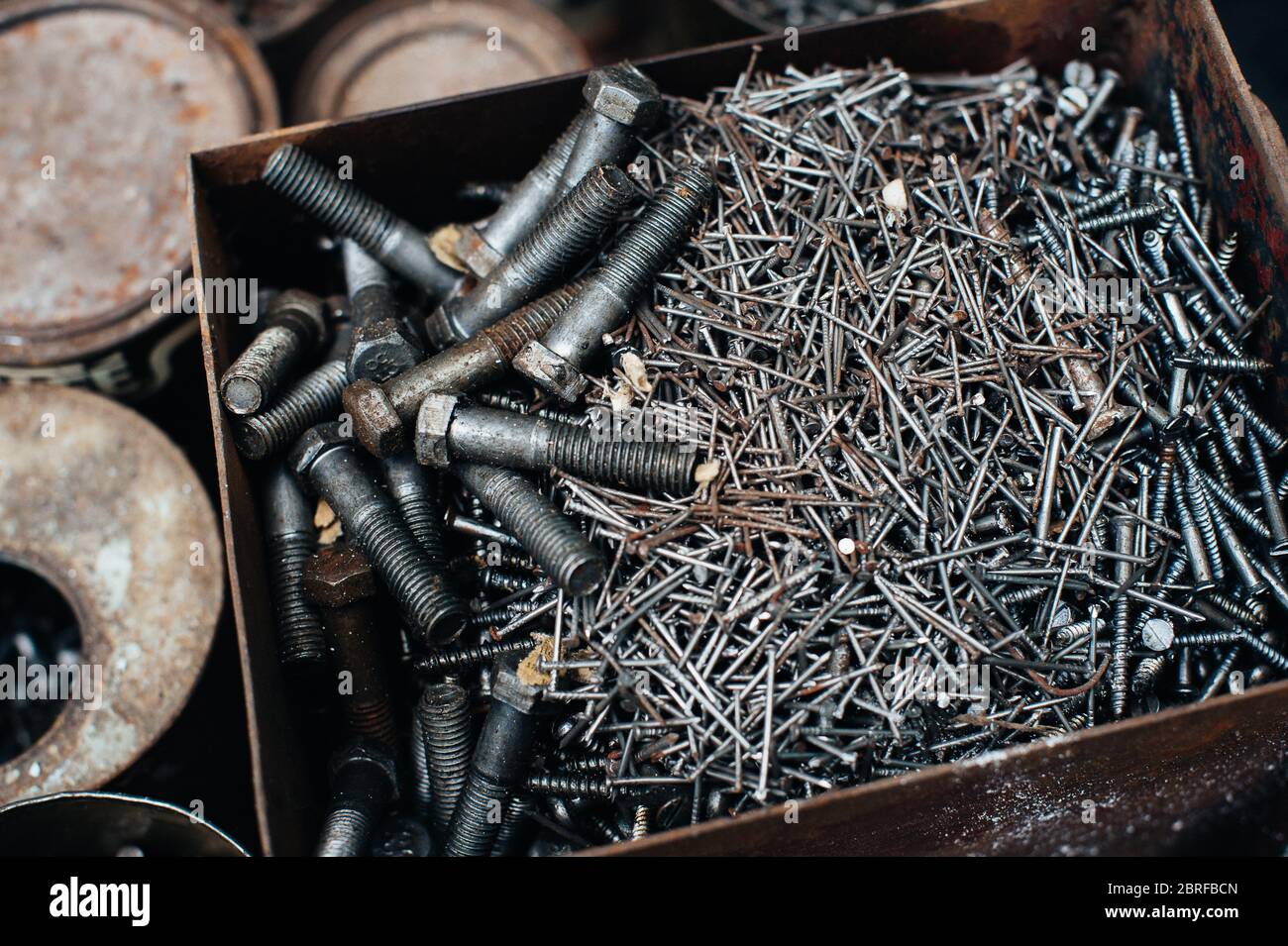 Scrap metal. Box with old rusty nails. Closeup. Macro Stock Photo Alamy