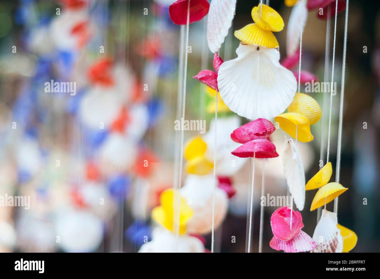 Coloured Shells on strings. Kampong Chhnang Province, Cambodia, Southeast Asia Stock Photo