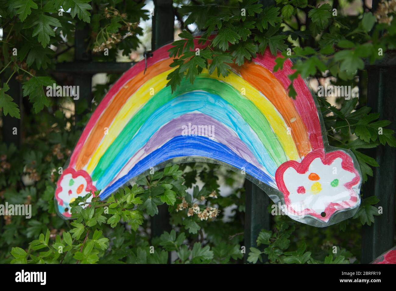 Painting of rainbows by children displayed outside primary school to ...