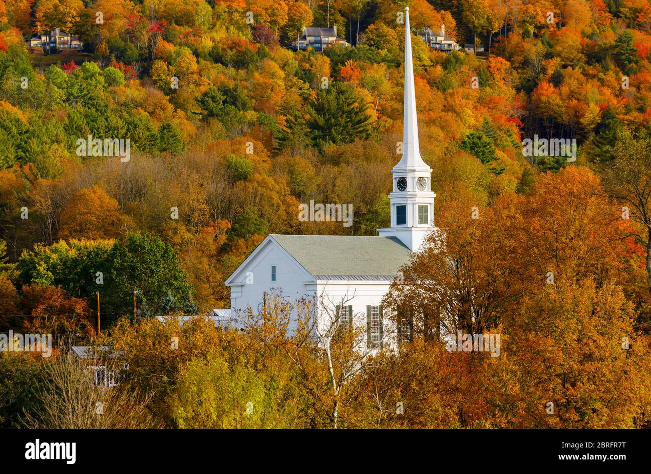 View of the famous non-denominational Stowe Community Church in Main Street, Stowe, Vermont, New England, USA in autumn colours Stock Photo