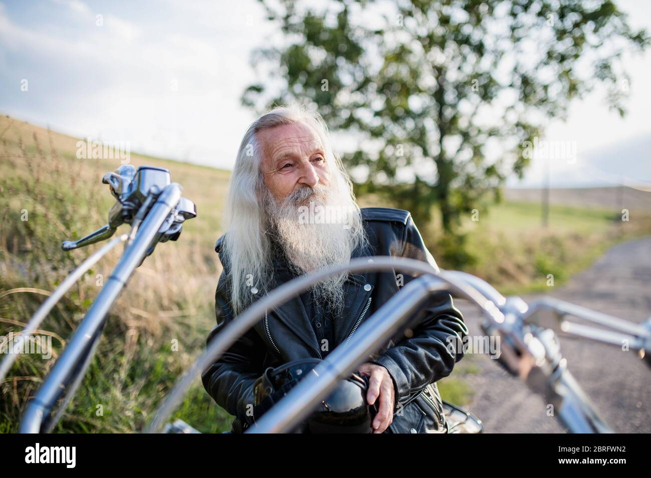 Old man in leather jacket hi-res stock photography and images - Alamy
