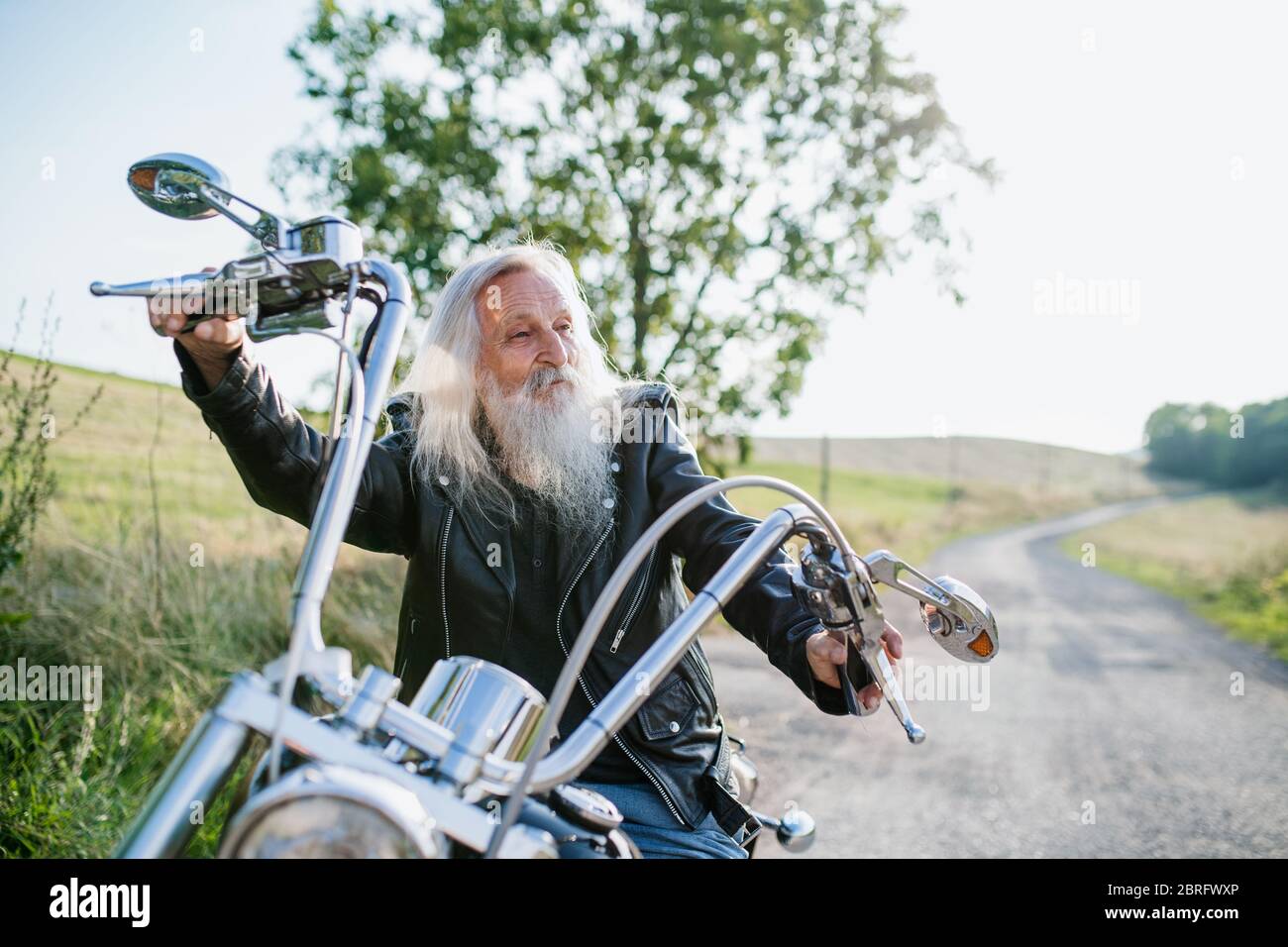 Old man in leather jacket hi-res stock photography and images - Alamy