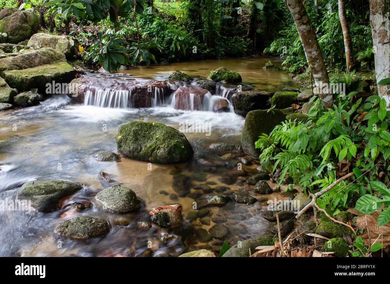 Waterfall & Chess by the riverside Stock Photo - Alamy