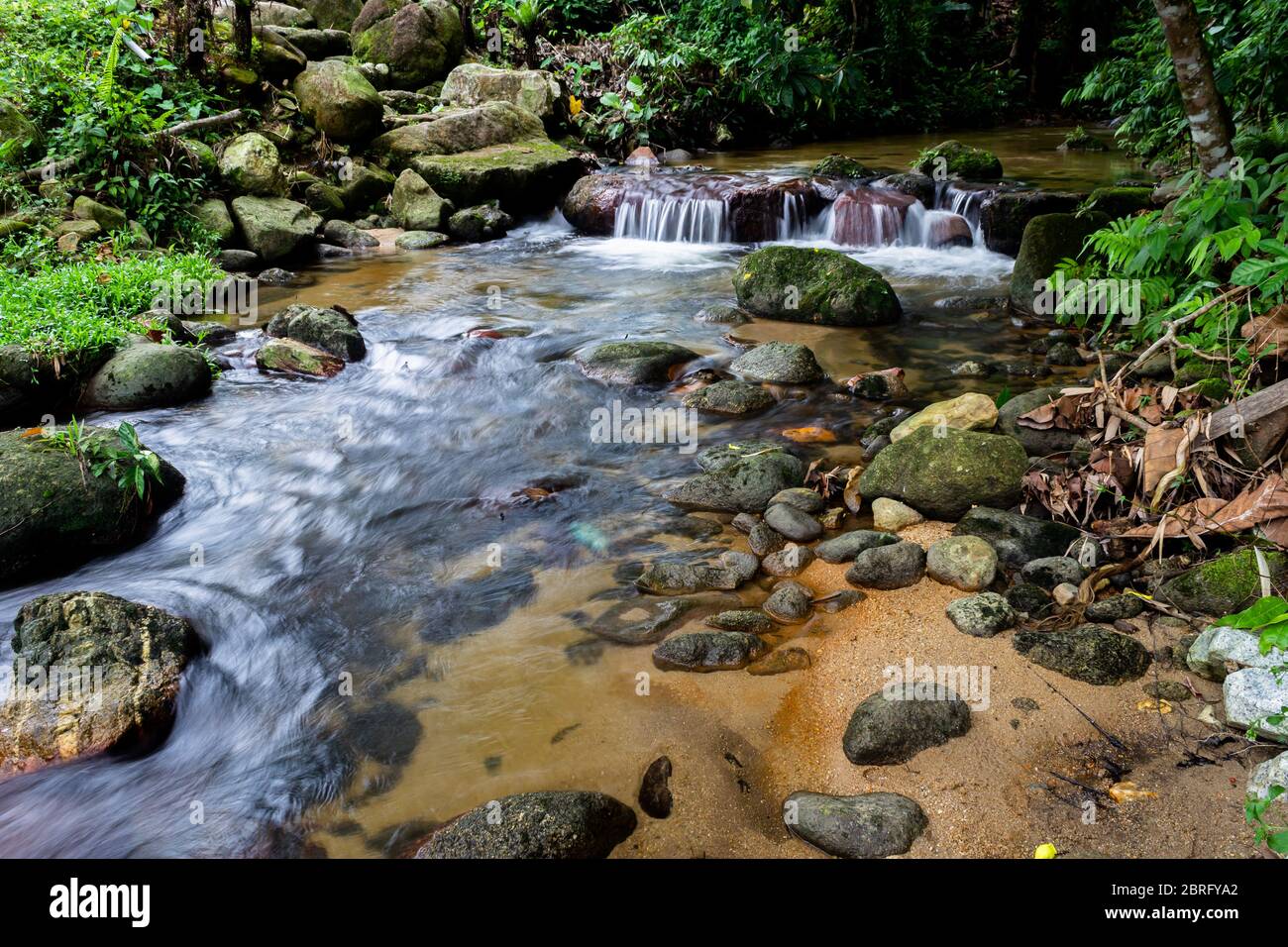 Waterfall & Chess by the riverside Stock Photo - Alamy