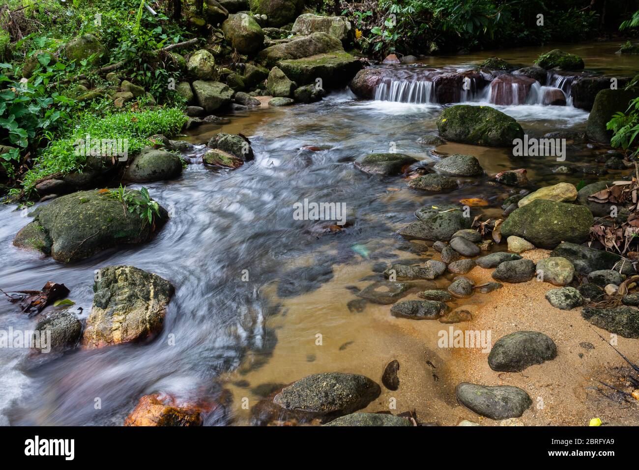 Waterfall & Chess by the riverside Stock Photo - Alamy