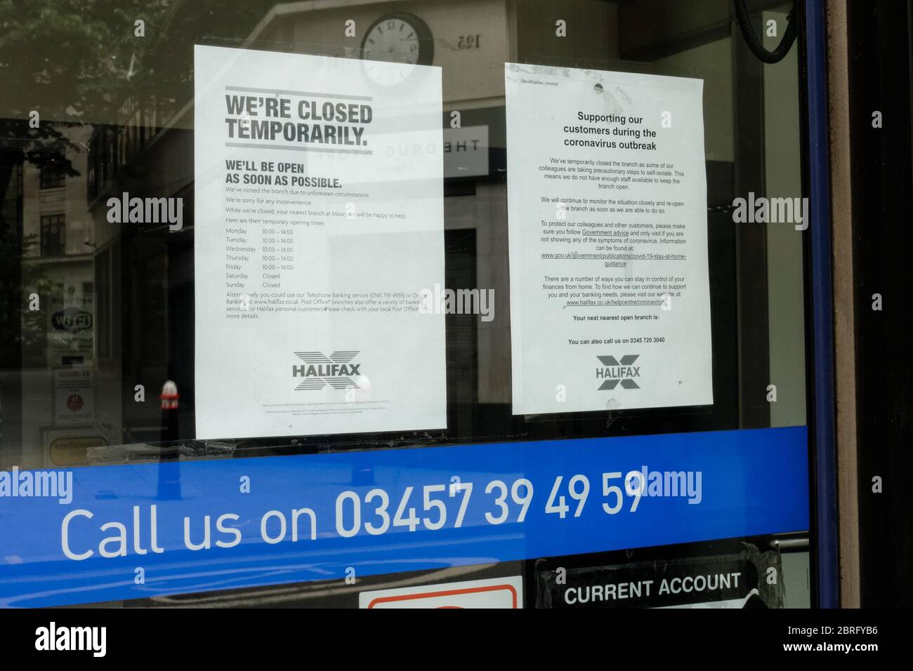 Shop notice for customers on Halifax bank branch, temporarily closed due to coronavirus lockdown, London England UK Stock Photo