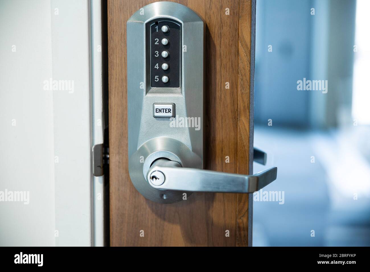 Digital smart door lock security system with a password, close up on numbers on the screenPass Code Door Handle Lock. Stock Photo