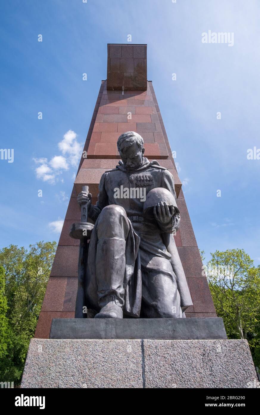 Statue of kneeling Soviet soldier at Soviet war memorial, Treptower