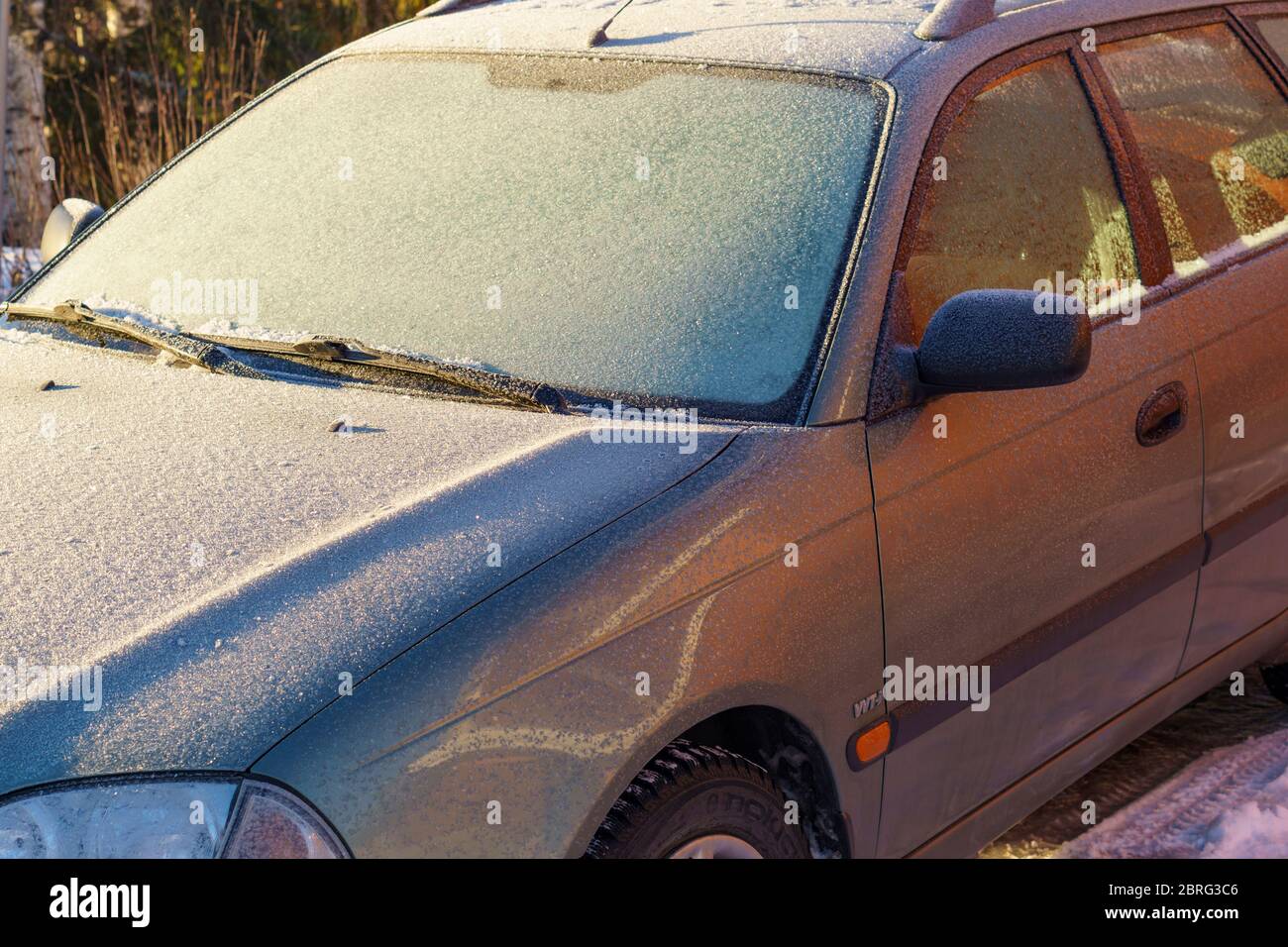 Toyota car covered with frost and ice at Winter , Finland Stock Photo
