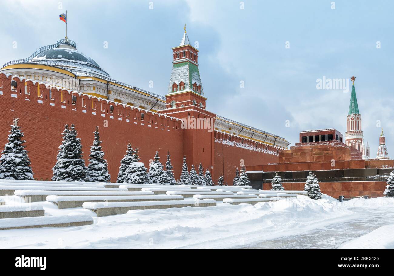 Moscow Kremlin with Lenin's Mausoleum on the Red Square during snowfall in winter, Moscow, Russia. The Red Square is the main tourist attraction of Mo Stock Photo