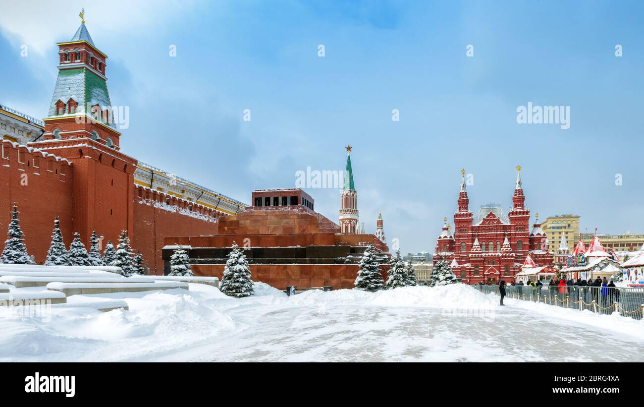 Moscow, Russia - February 5, 2018: Moscow Kremlin with Lenin's Mausoleum on Red Square in winter during snowfall. Red Square is the main tourist attra Stock Photo