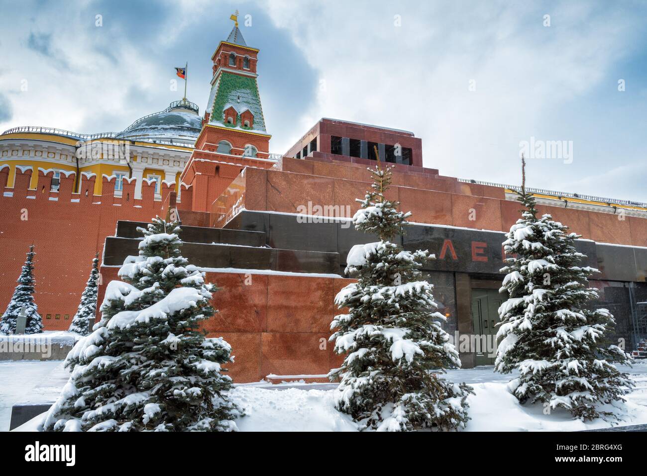 Lenin's Mausoleum by Moscow Kremlin on the Red Square in winter during snowfall. Moscow, Russia. The Red Square is the main tourist attraction of Mosc Stock Photo