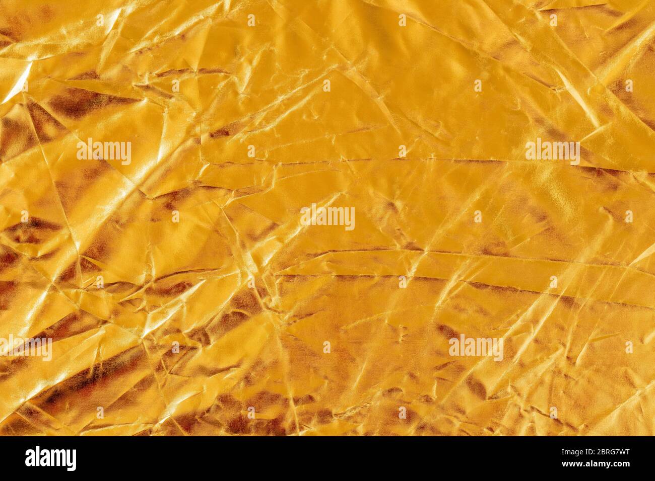 Shiny yellow leaf gold foil texture. Can be used as background. Stock Photo