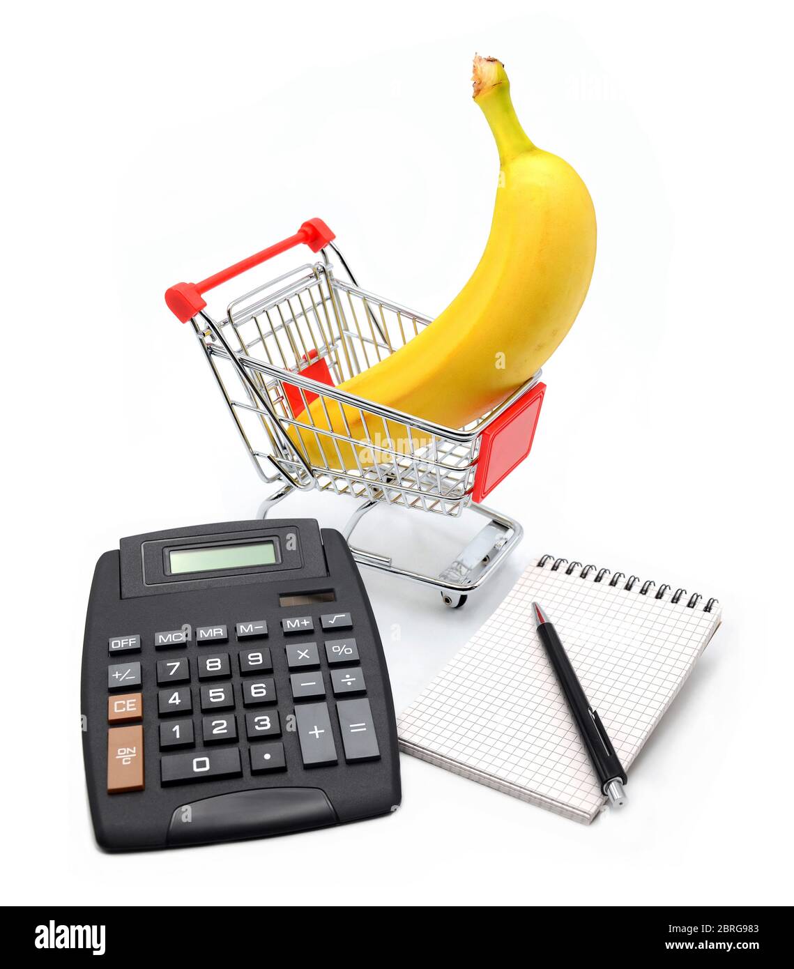 Shopping cart with calculator and paper note book Stock Photo Alamy