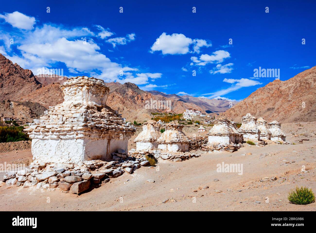 White stupas near the Likir Monastery or Gompa in Likir village near Leh in Ladakh, north India Stock Photo