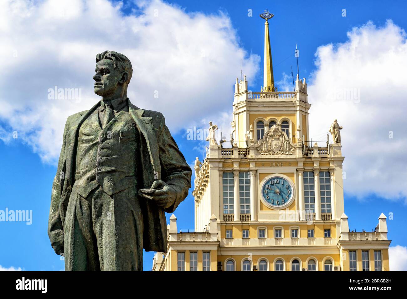 Monument to the Soviet poet Vladimir Mayakovsky and Hotel Beijing on Triumph Square. The monument was erected in 1958. Stock Photo