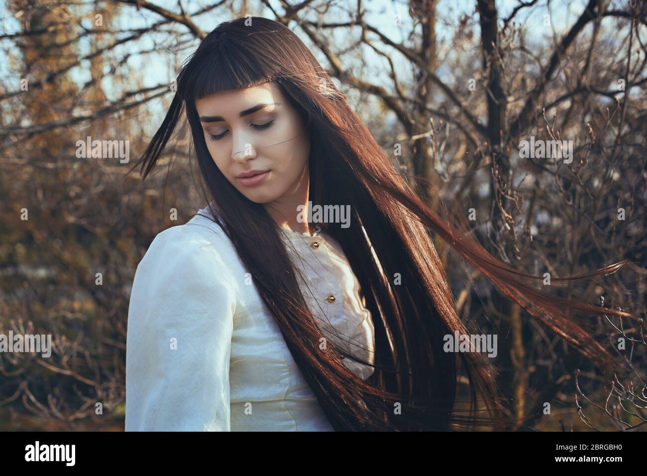 Romantic girl with vintage bride dress . Purity and sadness Stock Photo