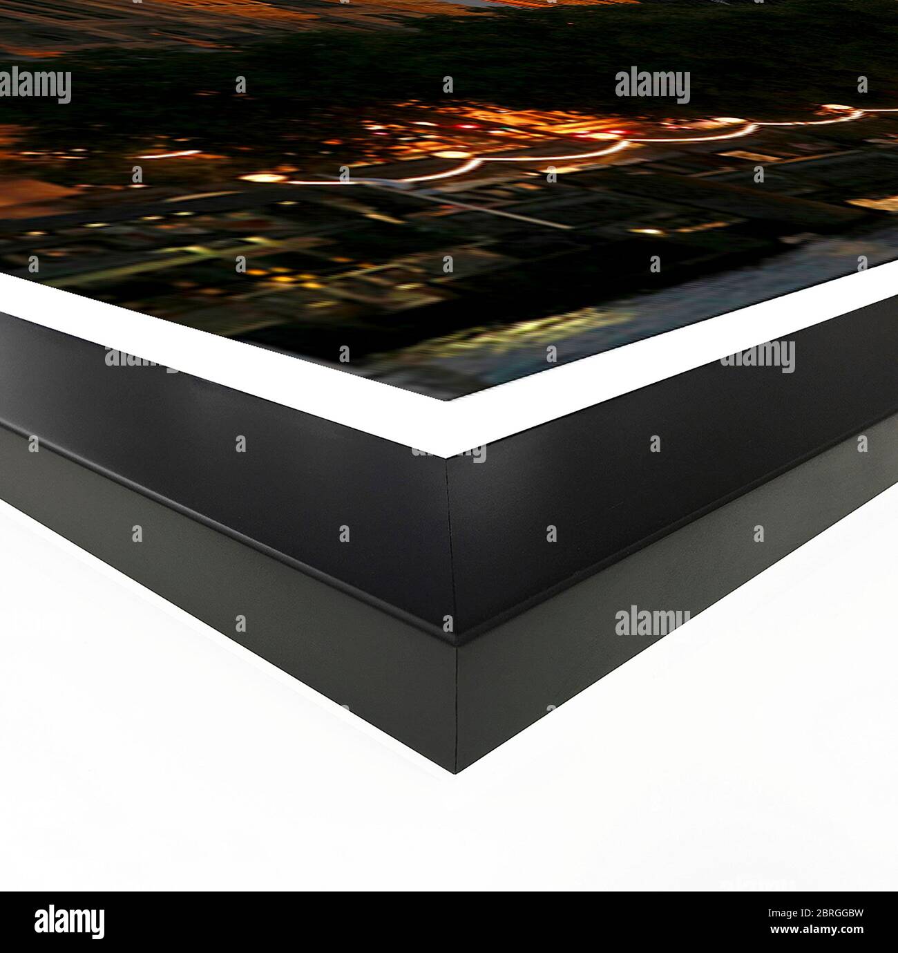 The corner and edge of a high quality wood photo frame complete with