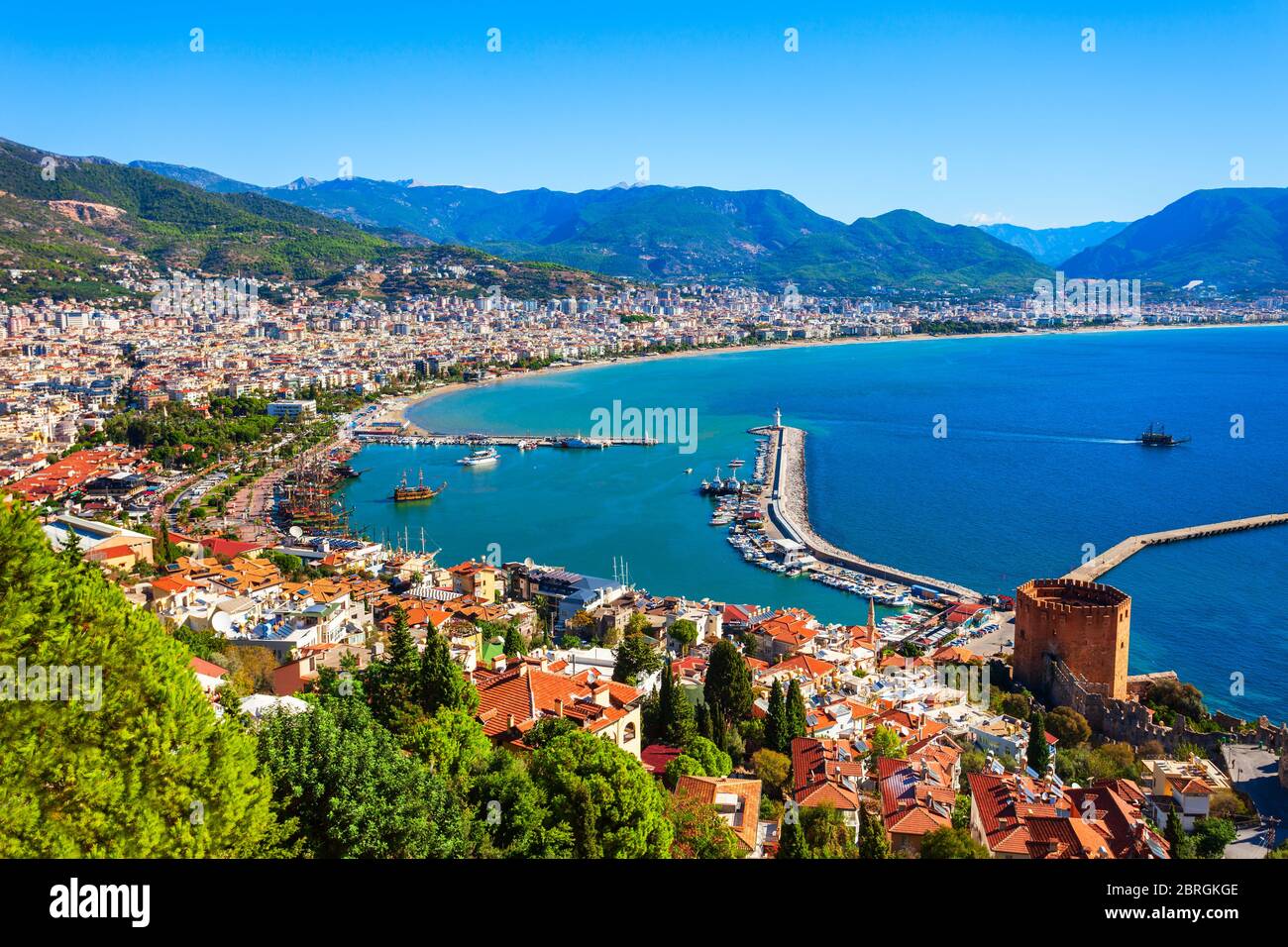 Kizil Kule or Red Tower and port aerial panoramic view in Alanya city, Antalya Province on the southern coast of Turkey Stock Photo